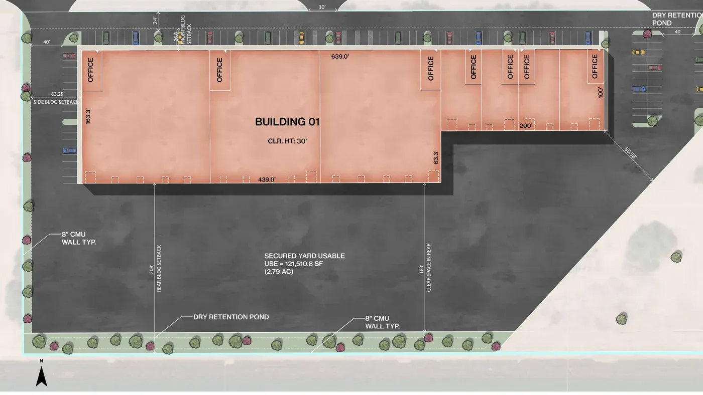 Colored conceptual site plan of a long industrial building with offices along the front, parking along the street side, a large secured yard at the rear, and landscape buffers at the lot edges.